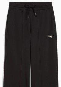 Black Puma sweatpants with drawstring waistband, side pockets, and white Puma logo on the right thigh.