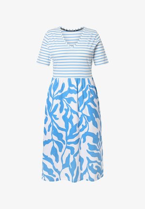 Pruhované modro-bílé šaty s krátkým rukávem a výstřihem do V. Sukně má výrazný modrý botanický vzor na bílém pozadí. Materiál je směs bavlny.