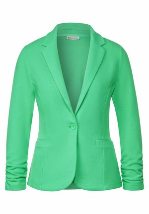 Green, fitted blazer made of soft fabric. Features a single button, notched lapels, and two side pockets. Smooth texture with long sleeves.
