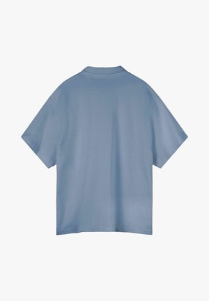 T-shirt bleu clair uni à manches courtes vu de dos avec un col rond, présenté sur fond blanc.