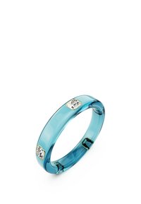 Blue translucent acrylic ring featuring three hexagonal accents with clear stones, smooth texture, and a modern, minimalist design.