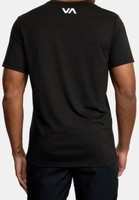 Black short-sleeve t-shirt made of soft fabric. Features a round neckline and a small white logo on the upper back. Fitted design.