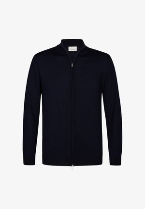 Marineblauwe ritssluiting vest gemaakt van zachte stof. Heeft een opstaande kraag, lange mouwen en een zachte textuur met een zilveren ritsdetails.