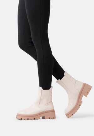 WINTER BOOTIES - Stivaletti con plateau - beige