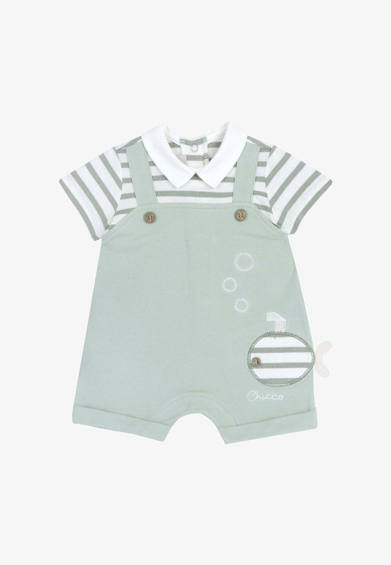 Une combinaison vert clair avec un haut à manches courtes rayé, des boutons sur le devant et un design de baleine avec des bulles brodées sur le côté.