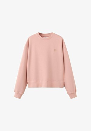 Sweat-shirt rose clair à col rond avec manches longues et petit logo brodé en forme d'éclat de soleil sur la poitrine gauche.