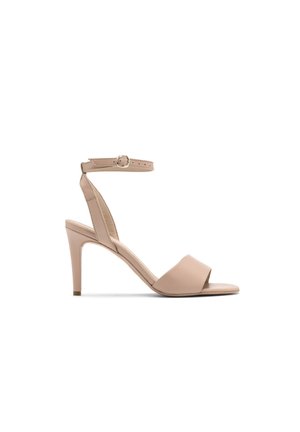 High heeled sandals - beige