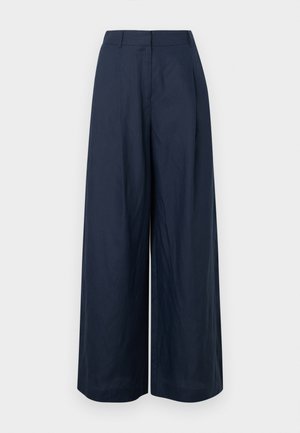 Tumesinised laia lõikega püksid puuvillasegusest kangast. Omavad lamedat esiosa ja kahte küljetaskut, pakkudes mugavat lõiget.