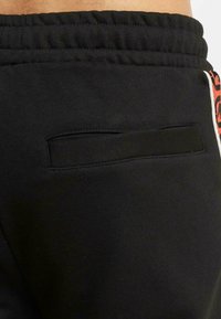 ecko unltd. VINTAGE JOGGING - Verryttelyhousut - black