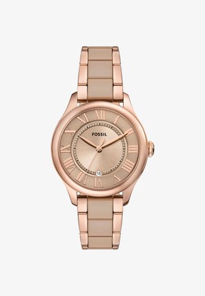 Montre-bracelet en or rose avec chiffres romains, cadran rond, guichet de date à 6 heures, trois aiguilles et bracelet à maillons métalliques.