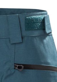 Teal broeken van een gestructureerde stof, met een zwarte riem, een glanzend detail met een sprankelende afwerking en een ritszakje.