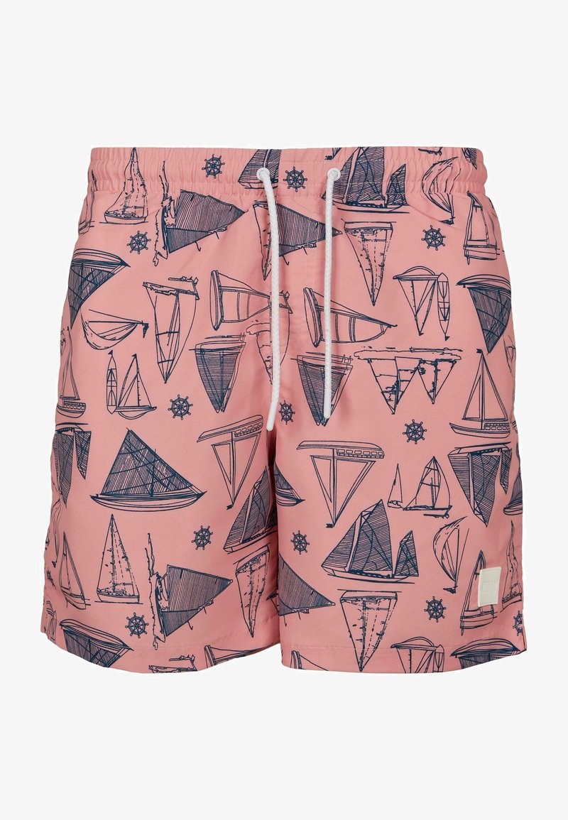 Pink swim shorts with a nautical sailboat print in navy blue, featuring an elastic waistband and white drawstring. Designed for water activities.