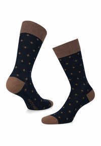 Granatowe skarpetki z brązowym ściągaczem i palcami, ozdobione małymi złotymi akcentami w kropki na całej powierzchni. Wykonane z mieszanki bawełny.