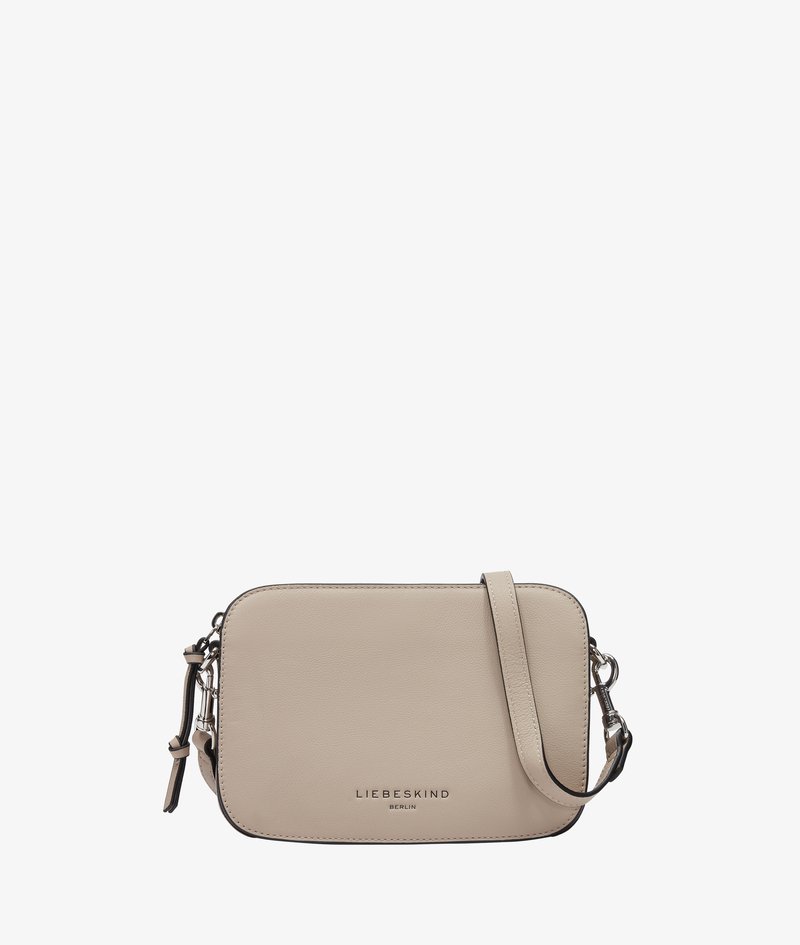 Beige rectangular leather crossbody bag with adjustable strap and silver hardware, branded "Liebeskind Berlin" on the front.