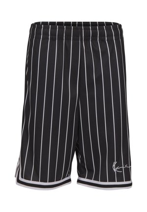 Fekete kosárlabdazsák fehér függőleges tűcsíkokkal és fehér aláíráslogóval a alsó szegély közelében.