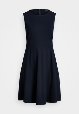Navy blue sleeveless dress with a round neckline, fitted bodice, and flared skirt. Made from soft fabric, featuring a back zipper closure.