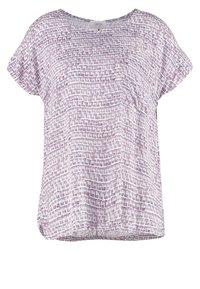 Lätt, kortärmad topp i lavendel och vitt med ett geometriskt mönster. Har rund halsringning och avslappnad passform. Mjuk, texturerad tyg.