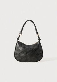 Black woven leather handbag with a curved shape, featuring a single shoulder strap and a gold-tone zipper on top.