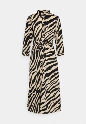 Langes Hemdkleid aus weichem Stoff mit einem schwarz-beigen Zebra-Punktmuster, einem Kragen, Knöpfen vorne und einem gebundenen Taillenbereich.