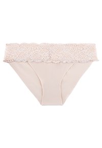 Culotte beige avec bordure en dentelle, en tissu lisse et doux. Dentelle florale décorative à la taille, bord ondulé et design sans coutures.