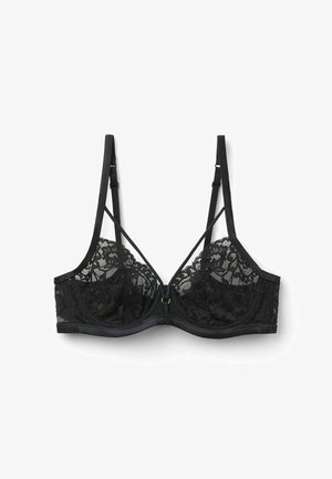 Sujeción con aro de encaje negro con tirantes ajustables y tirantes decorativos delanteros sobre un fondo blanco.