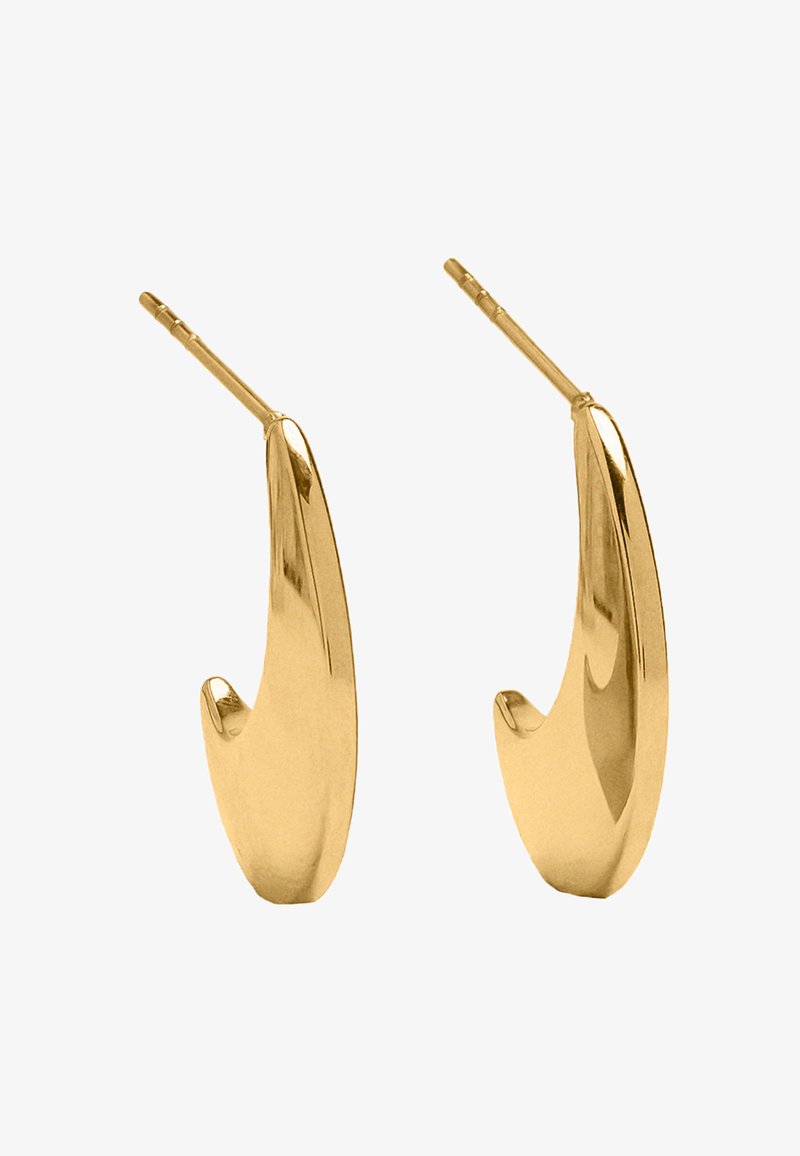 Kolczyki z metalowym, złotym wykończeniem o płynnym, zakrzywionym kształcie. Gładka powierzchnia z polerowanym wykończeniem. Wyposażone w zawiasowe zapięcie zapewniające pewne noszenie.