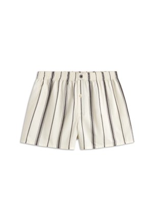 Bavlnené boxerské šortky v krémovej farbe s čiernymi vertikálnymi pruhmi, s elastickým pásom a tlačidlovým zapínaním. Prispôsobený strih.