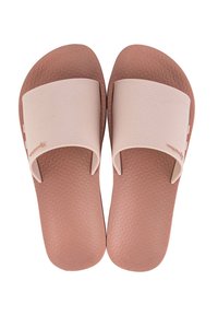 Infradito rosa chiaro con suola in gomma testurizzata, fascia superiore ampia e superficie liscia. Progettati per il comfort e l'uso informale.