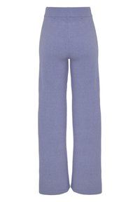 Licht paarse wijdebroek gemaakt van zachte gebreide stof, met een effen kleur ontwerp en een geribde elastische tailleband.