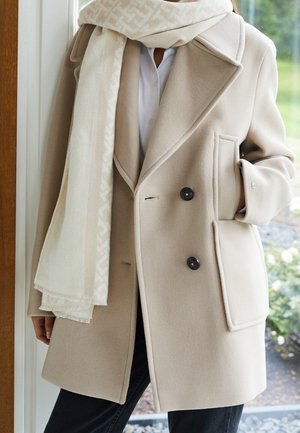 Halflange jas - beige