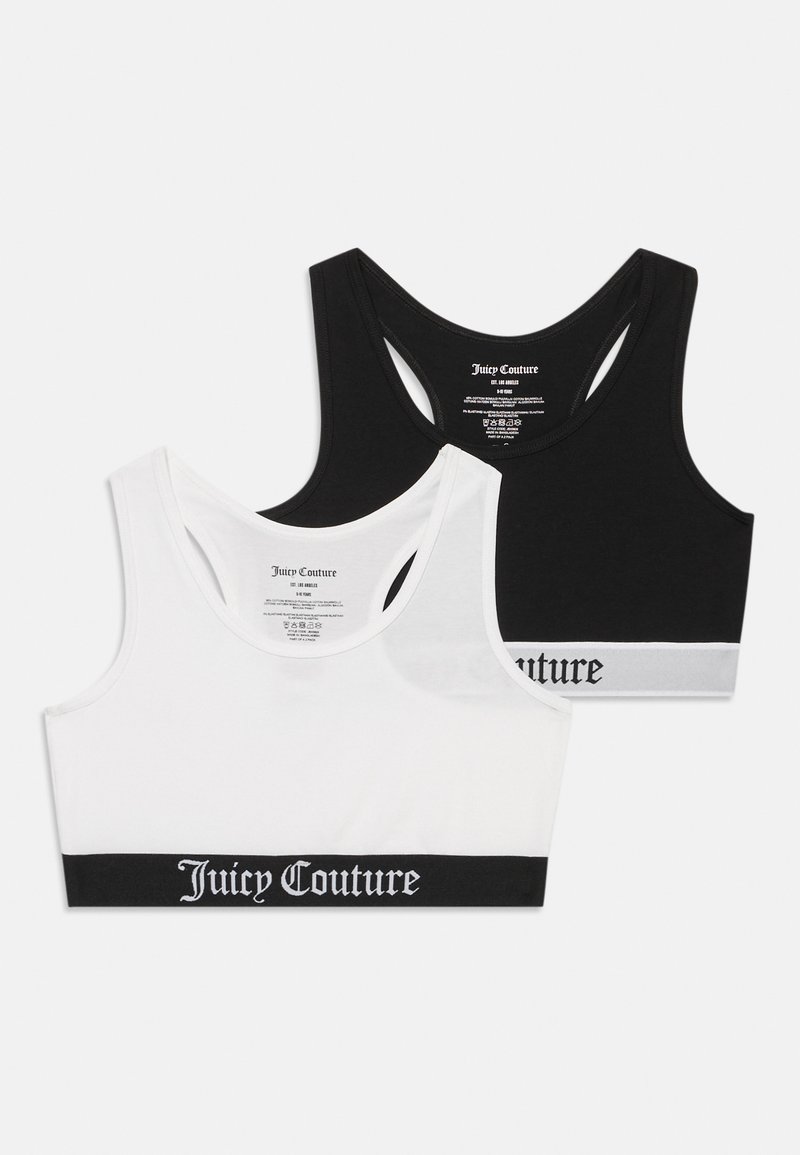 Dvoje prepadávacích crop topov od Juicy Couture, jedny biele s čiernym lemovaním a jedny čierne s bielym lemovaním, obe s logom na spodnom leme.