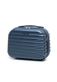 Valigia rigida da viaggio di colore blu navy con scanalature orizzontali, accessori in argento, maniglia superiore e chiusura a doppia cerniera. Design compatto per un facile trasporto.