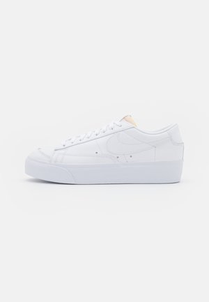 white nike platform shoes