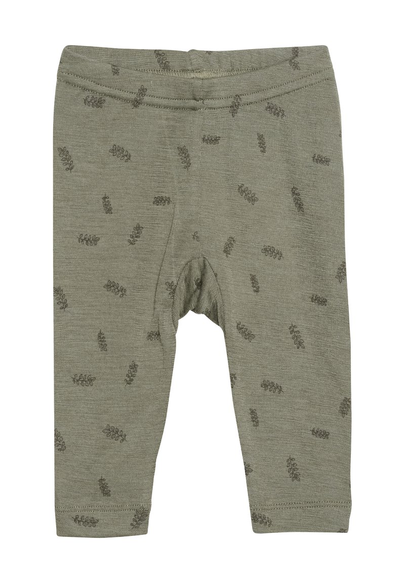 Olivgröna leggings i mjukt material med ett subtilt bladmönster i mörkare grönt. Elastisk midja och åtsittande passform.