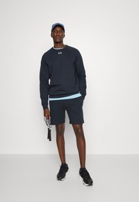 Under Armour RIVAL FLEECE - Sports shorts - black/white