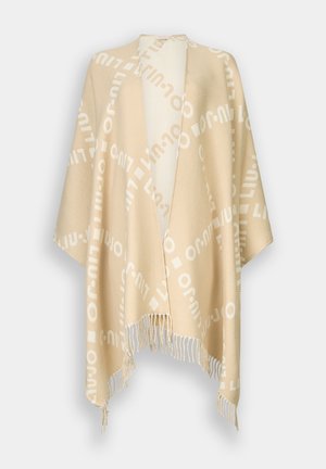 Poncho beige intrecciato con motivo a testo bianco, apertura frontale e bordi frangiati. Tessuto morbido, vestibilità rilassata e design leggero.