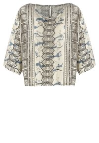 Kortärmad blus i krämfärg med blå och svarta blommönster, med en nyckelhålsöppning och lös, boxig passform.