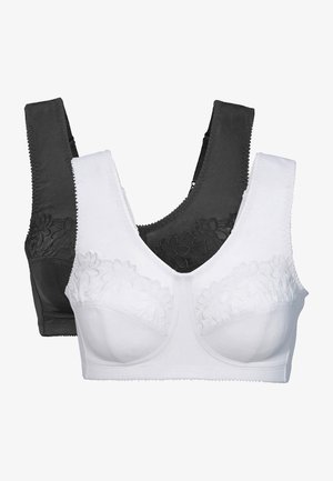 Bh-set met een wit en zwart ontwerp, gemaakt van zachte stof, met bloemenborduursel op de cups en brede banden voor ondersteuning.