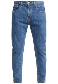 Ljust blå denimjeans, åtsittande design, femficksstil, med kopparhårdvara och en något urtvättad textur. Raka ben och utan dekorationer.