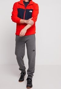 The North Face Suéter de forro polar - red