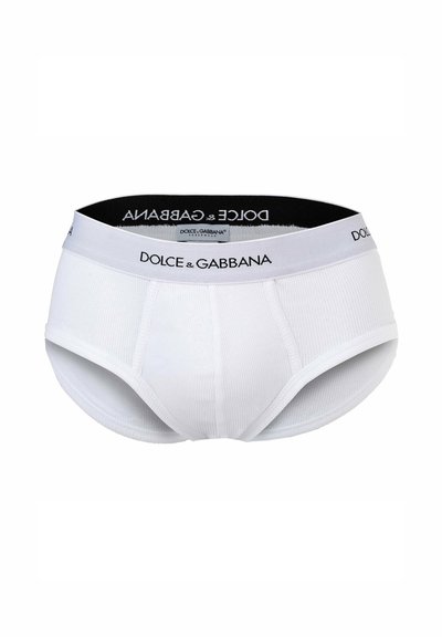 Caleçons en coton blanc avec une texture côtelée et une ceinture élastique noire arborant le logo "DOLCE & GABBANA". L'avant présente une pochette modelée.
