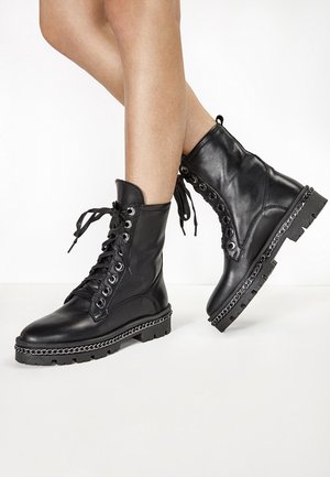 Botines con cordones - black