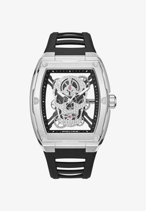 Skeleton sat koji ima kvadratno kućište od nehrđajućeg čelika, prozirni dizajn lobanje, crni gumeni remen i detalje u srebrnoj boji.