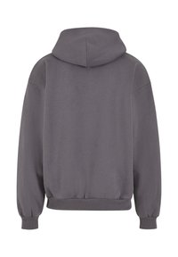 Szara bluza z kapturem z jednolitym wzorem, luźny krój, ściągacze u rękawów i na dole, wykonana z miękkiego materiału tekstylnego.