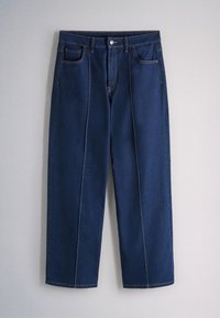 Dark blue straight-leg denim jeans with front seam details, belt loops, button closure, and front and back pockets on a light background.