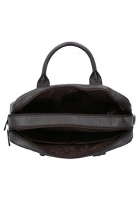 Brown leather bag with two top handles. Features a spacious interior with an open compartment and a zippered section for organization.