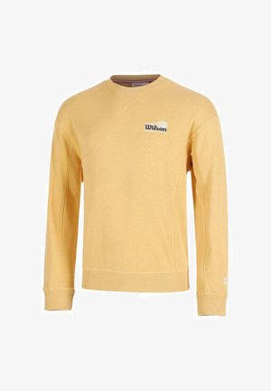 Felpa gialla con girocollo e maniche lunghe, con un piccolo logo "Wilson" sul petto in alto a sinistra e sul polsino della manica.