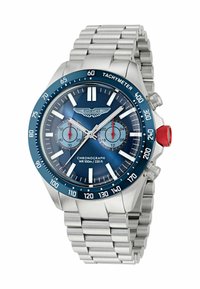 Kronograafkellaga roostevabast terasest rihm, sinine kellaplaad, valged ja punased aktsendid, taksimeteri raami ja veekindlus kuni 100 meetrit.