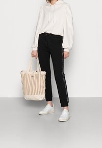 Calvin Klein Teplákové kalhoty - black