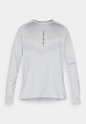 Light grey long-sleeve athletic shirt with a crew neckline, featuring a subtle textured pattern and printed text reading "RUNNING IS MENTAL."